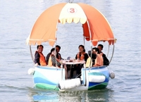 Cooling down on river in Pyongyang