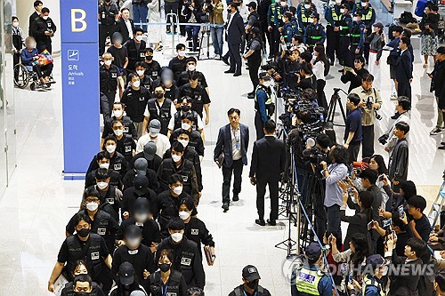  Police seek arrest warrants for 58 scam suspects brought from Cambodia